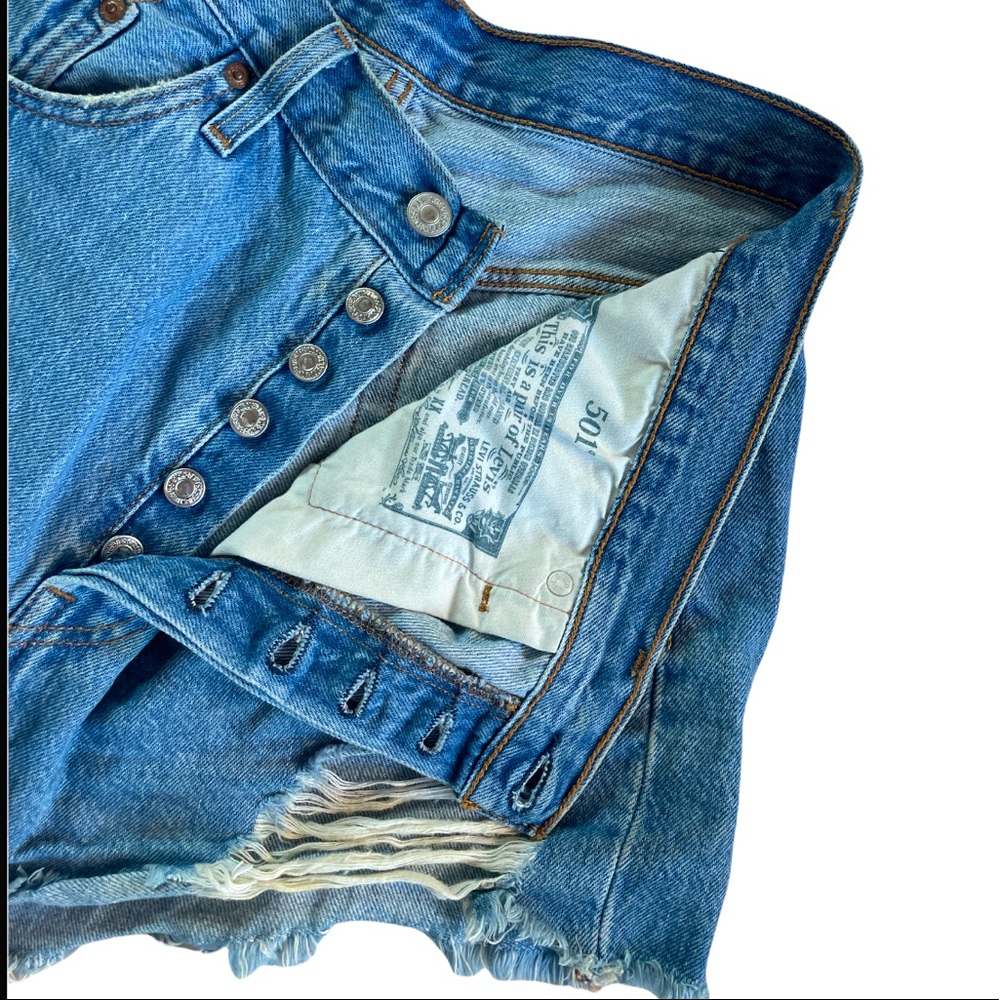 Women’s Levi’s ripped distressed shorts button fly high waisted light wash denim